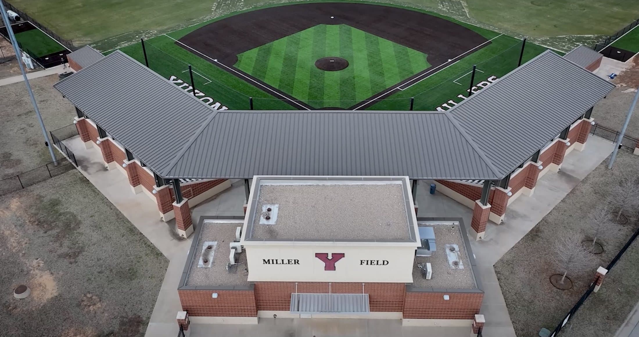 Aerial of the Miller Field clubhouse and grandstand, with the diamond beyond