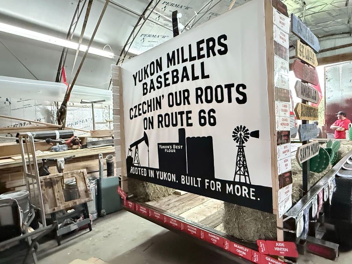 The back of the Yukon Baseball float reading Yukon Millers Baseball Czechin’ Our Roots on Route 66