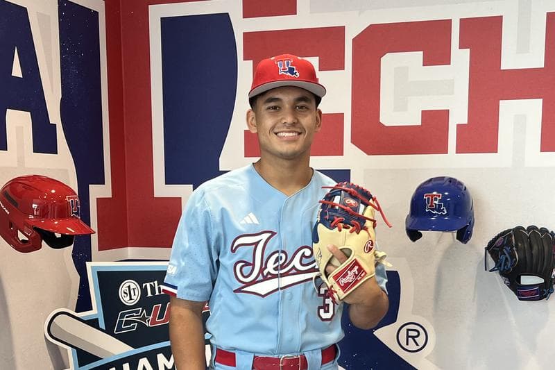 Eddie Fish in a Louisiana Tech uniform, holding a glove